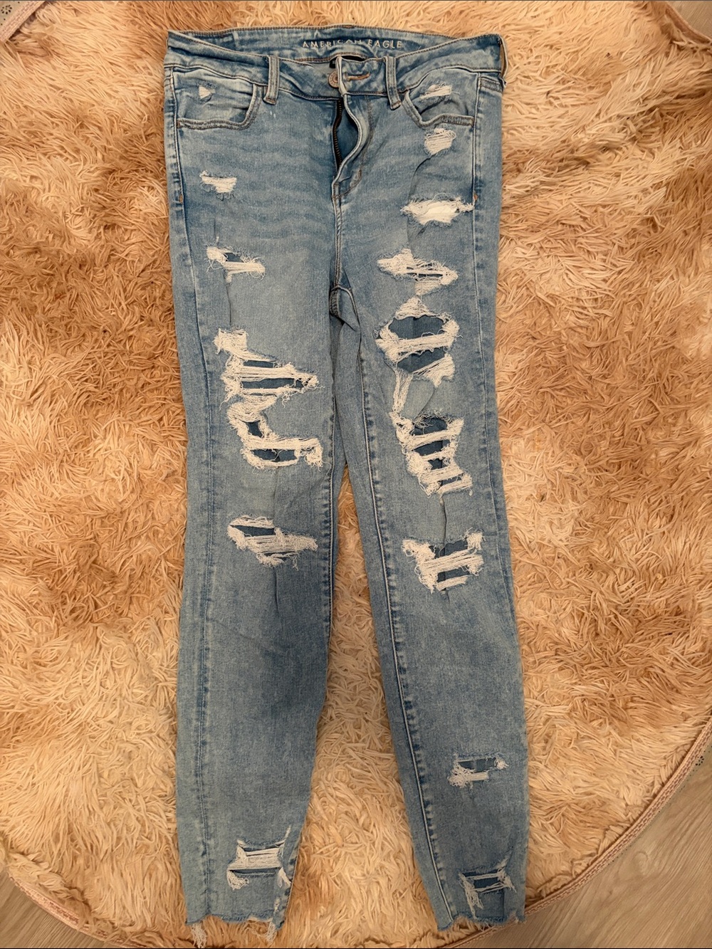 American Eagle Outfitters Next Level Stretch Light Blue Ripped Skinny Jeans